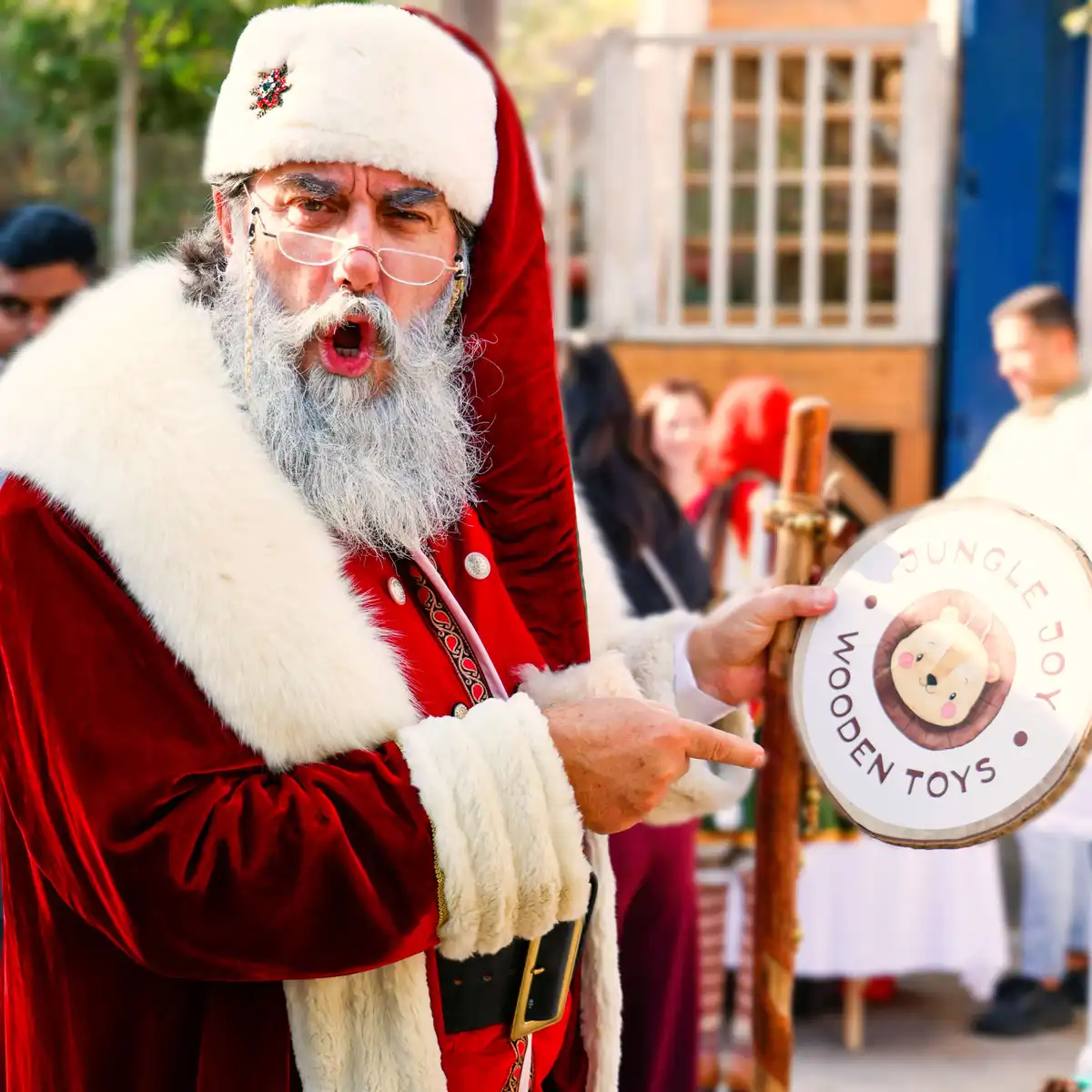 santa holding logo of junglejoy indicating Wooden Toys for Christmas